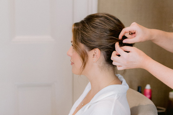 Siân Hair working on up-do for bridal client